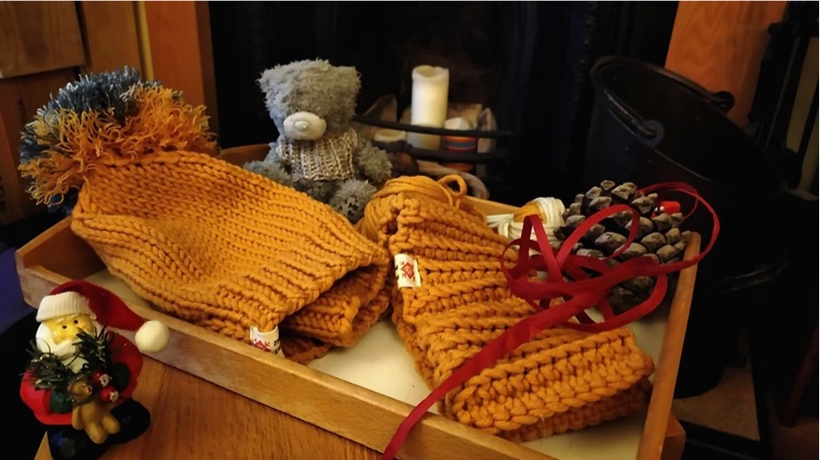 image of Oskana's knitted items for her new business