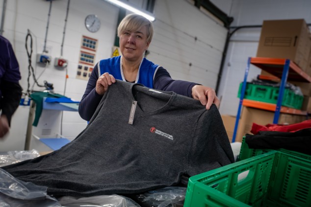 ELITE Clothing Solutions - showing off garment